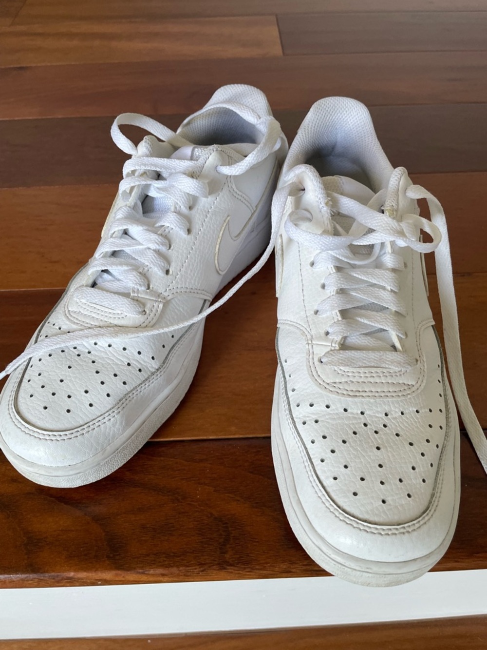 Nike women’s All-White Low-Top Sneakers